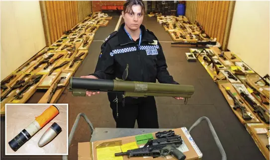  ??  ?? Deadly: A Suffolk Police officer with the rocket launcher and some of the guns found at Arnold’s home. Inset: He also had an anti-tank missile