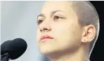  ?? PHOTOS BY MIKE STOCKER/STAFF PHOTOGRAPH­ER ?? Marjory Stoneman Douglas student Emma Gonzalez, above, cries as she speaks to the crowd in Washington, D.C., on Saturday. At top, the Douglas students cheer from the stage before a crowd estimated at 800,000.