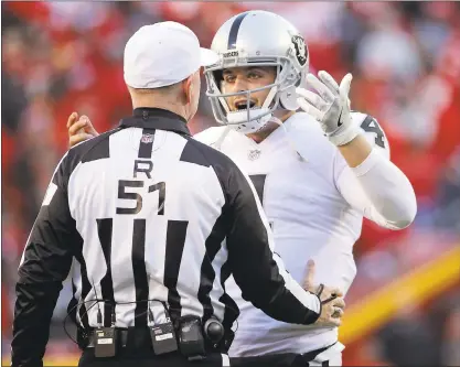  ?? CHARLIE RIEDEL — ASSOCIATED PRESS ?? According to Pro Football Focus, quarterbac­k Derek Carr is near the bottom of the league in downfield completion percentage, passes of 20 yards or more. Carr and coach Jack Del Rio admit that number has to improve the last three games.