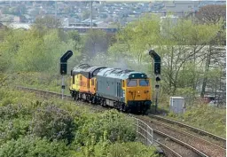  ?? GRAEME ELGAR ?? Left: There was a Highland ‘Hoover’ on
May 4, when
No. 50050 Fearless was sent to Inverness Millburn Yard to collect Type 3
No. 37116, which had failed at Helmsdale on a test train working. The two locos are pictured getting under way at Raigmore with the 0Z11/14.25 to York North Yard.