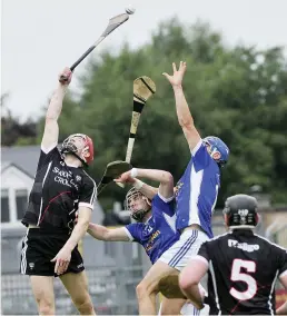  ??  ?? Sligo and Cavan battle for possession in the Lory Meagher Cup. Pics: Carl Brennan.