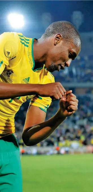  ??  ?? (Left) Mphela celebratin­g another Bafana Bafana goal, adding to his impressive record.