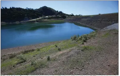  ?? (Tribune News Service/Bay Area News Group/Aric Crabb) ?? California’s Anderson Reservoir, which sits between the cities of San Jose and Morgan Hill, holds 89,278 acre-feet of water when full, more than the water district’s other nine reservoirs combined. After the driest February on record, it is at just 29% of capacity.