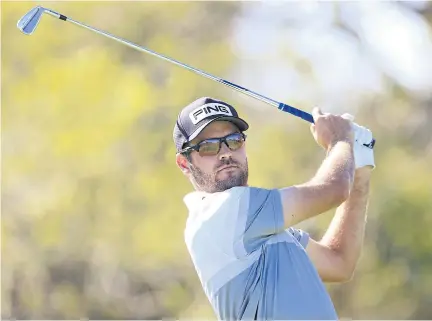  ??  ?? SOLID ROUND: Corey Conners plays his shot from the seventh tee during the second round of the Arnold Palmer Invitation­al.