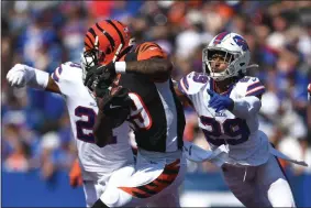  ?? ADRIAN KRAUS - THE ASSOCIATED PRESS ?? Buffalo Bills’ Kevin Johnson (29) tackles Cincinnati Bengals’ Auden Tate (19) during the first half of an NFL football game Sunday, Sept. 22, 2019, in Orchard Park, N.Y.