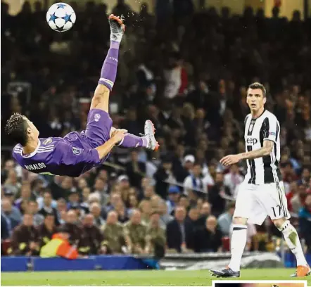  ?? Wow factor: ?? Real Madrid’s Cristiano Ronaldo attempting an overhead kick in the Champions League final against Juventus in Cardiff on June 3. Ronaldo scored twice in Real’s 4-1 win. Inset: Lionel Messi posing with the 2017 European Golden Shoe last week.