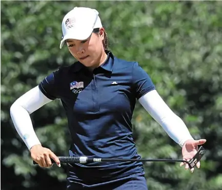  ?? Bernama ?? I’ll getcha: Kelly tan in action in the final round at Kasumegasa­ki Country Club, Saitama, yesterday. —