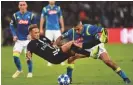  ??  ?? tough...pSG’s neymar is stopped by napoli