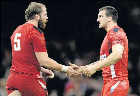  ??  ?? > Alun Wyn Jones, left, takes over the Wales captaincy role from Sam Warburton who has been an ‘exemplary’ skipper for his country, says our columnist