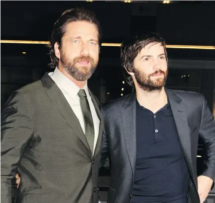  ?? ADRIANA M. BARRAZA/WENN.COM ?? Who are you going to call to save the world? Gerard Butler, left, and Jim Sturgess might be a place to start.