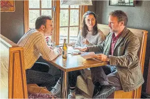  ?? CLAIRE FOLGER IMDB.COM ?? The sweater Chris Evans wore in this “Knives Out” scene inspired knitters to recreate its pattern.