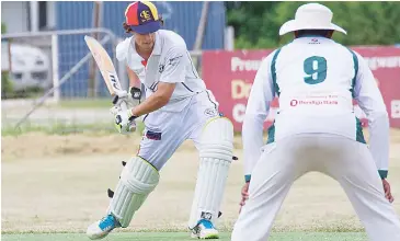  ??  ?? Dominic Pullen looks to get forward and drive the ball down the ground before being caught for 10.