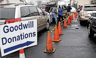  ?? AJC FILE ?? While Goodwill is well known for collecting donations at its many locations in Roswell and across the U.S., Goodwill North Georgia is also known for making the most of connecting employers with job seekers, many of whom the Goodwill career centers have helped prepare for interviews and landing a job.