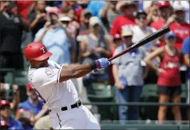  ?? TONY GUTIERREZ — THE ASSOCIATED PRESS FILE ?? Texas Rangers' Adrian Beltre follows through on a double for his 3,000th career hit in 2017. Beltré was elected to baseball's Hall of Fame on Tuesday.