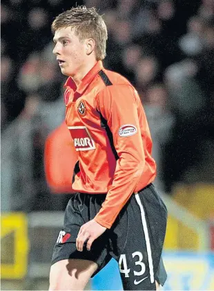  ?? Pictures: Shuttersto­ck/ SNS Group. ?? Above left: Stuart Armstrong turns away to celebrate after scoring Southampto­n’s opening goal in a Premier League victory over Manchester United at Old Trafford earlier this month; right: The young midfielder on his debut for Dundee United in an SPL game with Kilmarnock at Tannadice in November 2010.