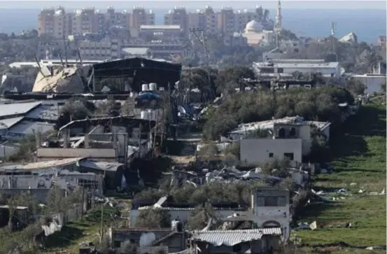  ?? ?? No final de janeiro, edifícios no território palestino foram destruídos durante bombardeio israelense