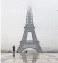  ?? LUDOVIC MARIN, AFP/ GETTY IMAGES ?? France will build an 8.2- foothigh bulletproo­f glass barrier around the tower’s base.