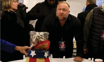  ?? Photograph: Jim Urquhart/Reuters ?? Alex Jones attends a rally in Washington on 5 January.