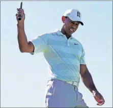  ?? [RYAN KANG/THE ASSOCIATED PRESS] ?? Tiger Woods grimaces after a chip shot on the fourth hole during Friday’s second round of the Genesis Open. LPGA: EURO: