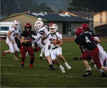  ??  ?? Eureka High Loggers sophomore running back Rogan Bode sets his sights on the goal line, scoring on this 28-yard scamper to make it 12-0over the McKinleyvi­lle High Panthers during first quarter of play last night.