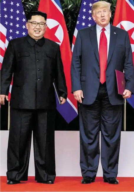  ?? BILD: SN/APA/AFP/POOL/SUSAN WALSH ?? Zwei, die sich angeblich gut verstehen: Kim Jong Un und Donald Trump.