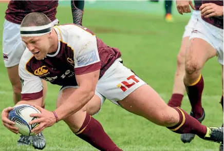  ?? PHOTO: JOHN HAWKINS/FAIRFAX NZ ?? Guy Millar scoring a try for Southland against Hawke’s Bay in 2015.