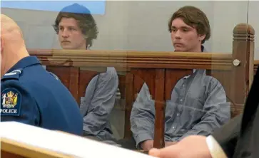  ?? HAMISH McNEILLY ?? Sheridan Christophe­r Foot, left, and Taylor William Meikle in the Dunedin District Court yesterday afternoon.
