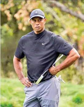  ?? AP PHOTO ?? Tiger Woods waits on the 10th green during the first round of the Zozo Championsh­ip golf tournament Thursday, Oct. 22, 2020, in Thousand Oaks, Calif.