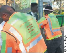  ??  ?? Two Old Mill High School learners are searched by School Safety Patrol members on Tuesday morning -