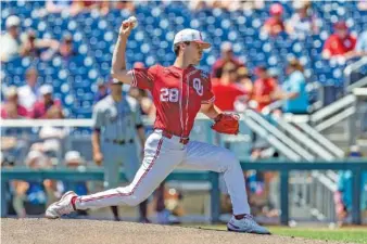  ?? AP PHOTO/JOHN PETERSON ?? Oklahoma starting pitcher David Sandlin was dominant as the Sooners defeated Texas A&M Wednesday to reach the College World Series championsh­ip round.