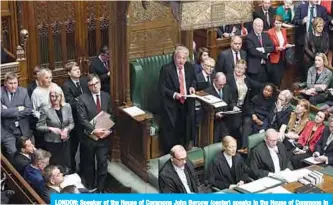  ?? —AFP ?? LONDON: Speaker of the House of Commons John Bercow (center) speaks in the House of Commons in London yesterday as Parliament resumes.