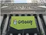  ??  ?? SPENCER PLATT, GETTY IMAGES The GoDaddy banner hangs outside of the New York Stock Exchange.