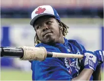  ??  ?? Vladimir Guerrero Jr. was so impressive as a young teenager that the Toronto Blue Jays’ front office was willing to trade prospects and spend the team’s entire internatio­nal bonus budget to sign him.