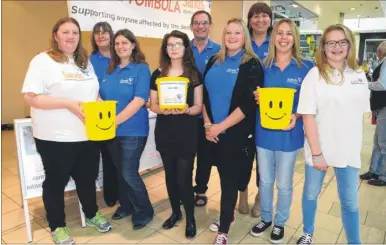  ?? Picture: Gary Browne ?? East Kent Sands volunteers during their fundraisin­g day at County Square
