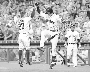  ?? THOMAS B. SHEA, USA TODAY SPORTS ?? Carlos Correa, left, and Jose Altuve form an enviable middle-infield duo.