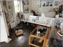  ?? CONTRIBUTE­D ?? Damaged displays at the Point Cabrillo Lighthouse visitor center after a 30foot wave that crested the bluffs and crashed into the building on January 4.