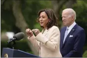  ?? CAROLYN KASTER — THE ASSOCIATED PRESS ?? President Joe Biden listens as Vice President Kamala Harris speaks in the Rose Garden of the White House in Washington on Monday.