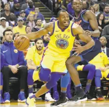  ?? Paul Kuroda / Special to The Chronicle ?? Andre Iguodala, driving on Oklahoma City’s Jerami Grant, has long prioritize­d defense and passing over scoring.