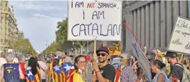  ?? ?? This file photo shows people taking part in demonstrat­ions to mark Catalonia’s national day ‘La Diada’ at the Plaza de Espana square in Barcelona, Spain on September 11, 2023
