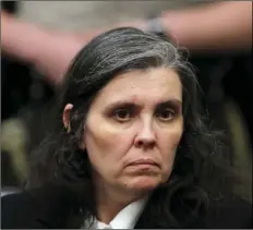  ??  ?? In this Jan. 24 file photo, Louise Turpin appears in court in Riverside. David and Louse Turpin, who are charged with torturing their children by starving, beating and shackling them, were scheduled to appear Friday in a Riverside courtroom for a...