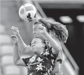  ?? Michael Wyke/Contributo­r ?? Newly acquired Dash forward Ebony Salmon, front, was at PNC Stadium earlier this season competing as a member of Racing Louisville FC.