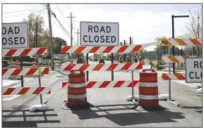  ?? (NWA Democrat-Gazette/Charlie Kaijo) ?? Part of South Arkansas Street is still closed as work continues between Pine and Poplar streets. The road is complete from Oak to Pine and from Poplar to Chestnut.