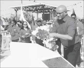  ??  ?? Opposition Leader Bharrat Jagdeo laying a wreath at Babu John on Sunday