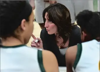  ?? DANA JENSEN/THE DAY ?? New London girls’ basketball coach Holly Misto gives instructio­ns to her team during a game against Ledyard on Feb. 16, 2016. The 10-0 Whalers are ranked No. 1 in the latest state poll.