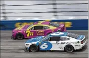  ?? MATT KELLEY/AP ?? Typical playoff participan­ts and past Cup champions like Brad Keselowski (No. 6, battling Corey Lajoie in Darlington, S.C., Sunday) remain outside looking in as the regular season nears the halfway point.