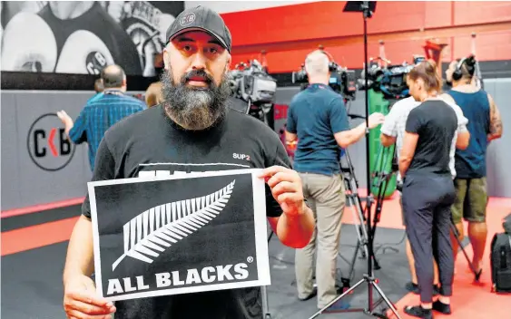  ?? Photo / Photosport ?? Eugene Bareman shows the silver fern logo that caused a brief issue with the UFC.