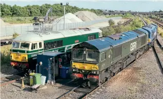  ?? RICHARD GENNIS ?? A chance meeting finds both of GBRf’s green locos at the company’s Peterborou­gh depot on July 15, with No. 69005 Eastleigh on the left and No. 66779 Evening Star on the right.