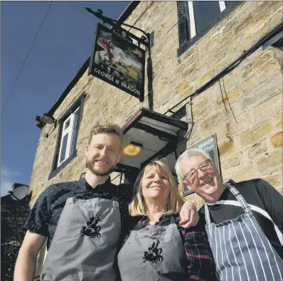  ?? PICTURE: GARY LONGBOTTOM. ?? COMMUNITY FOCUS: Stuart Miller, landlord of the George and Dragon at Hudswell with his parents Keith and Stephanie.