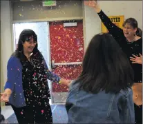  ?? Ryan Painter/The Signal ?? Students and staff surprise Erin Oxhorn-Gilpin, left, with a congratula­tory assembly at Northlake Hills Elementary School last week.