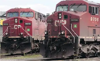  ?? RYAN REMIORZ/THE CANADIAN PRESS ?? The Teamsters union says CP Rail train operators walked out on Tuesday. However, a tentative three-year deal had been struck by the other union for 360 signalling workers.